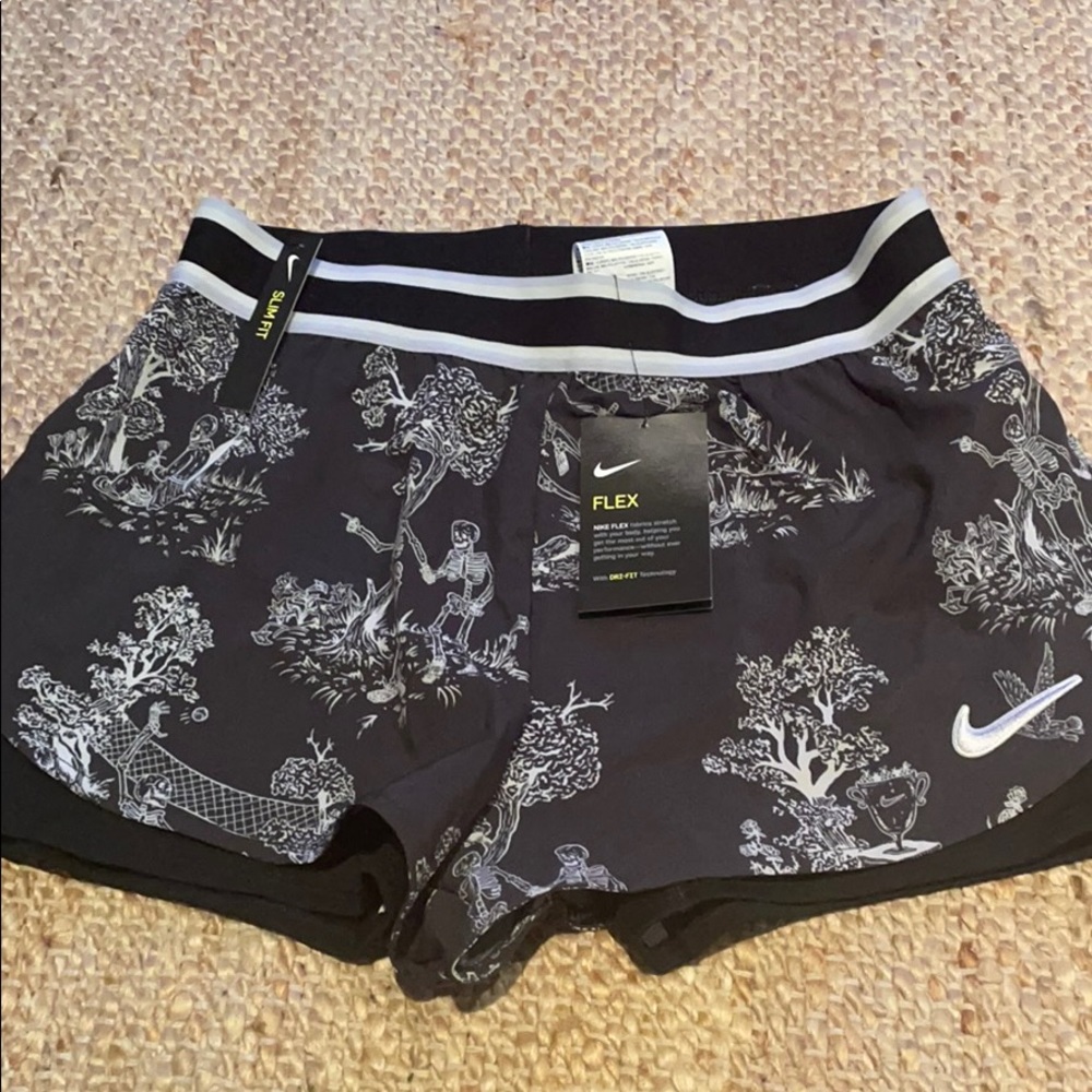 Nike slim fit tennis shorts w/ biker short detail